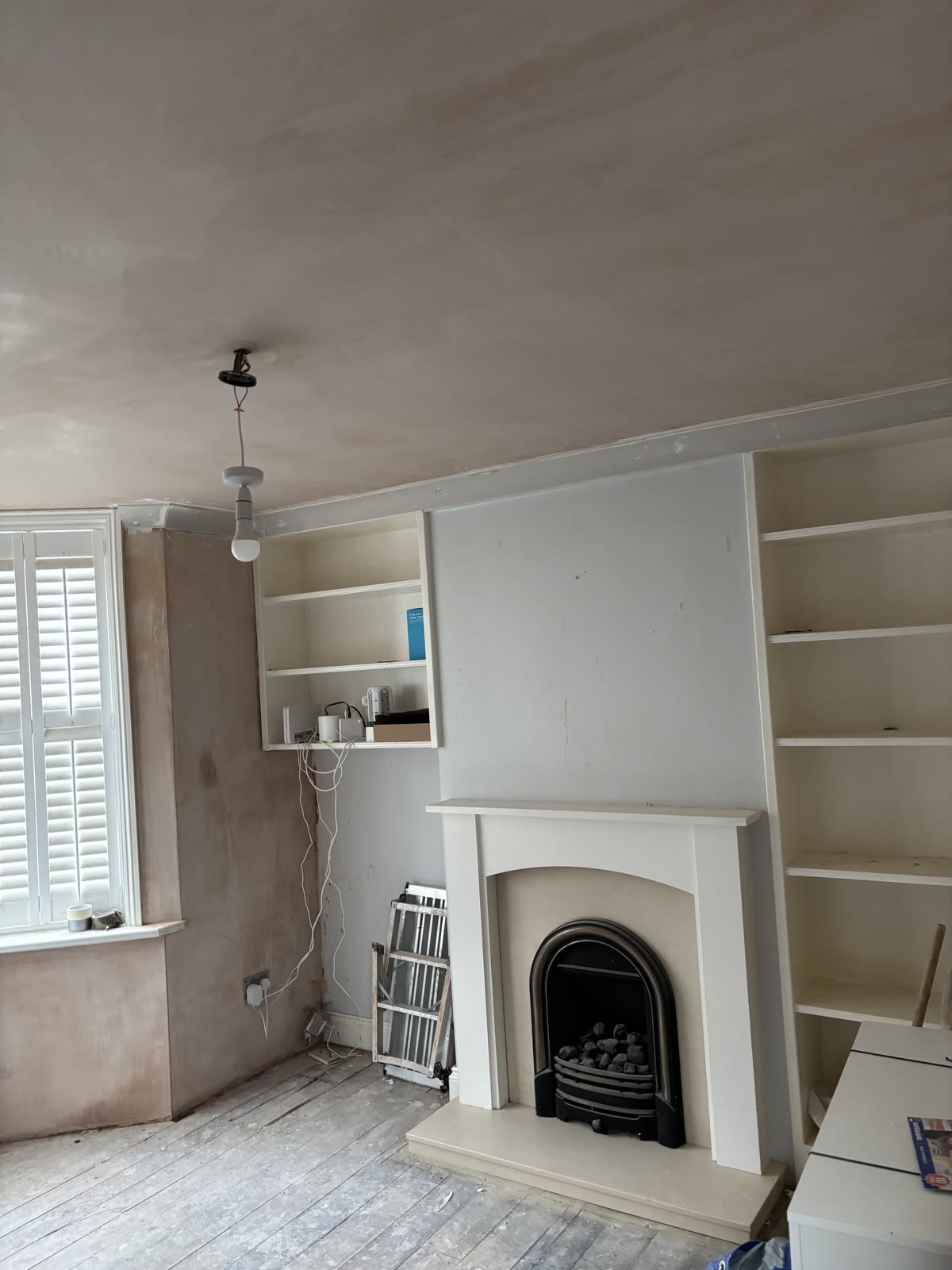 Fireplace wall skimmed