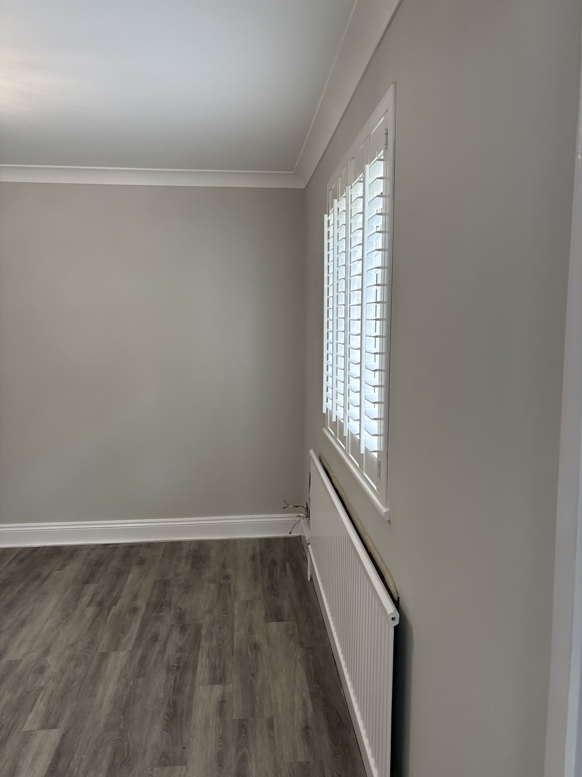 Finished room with interior shutters