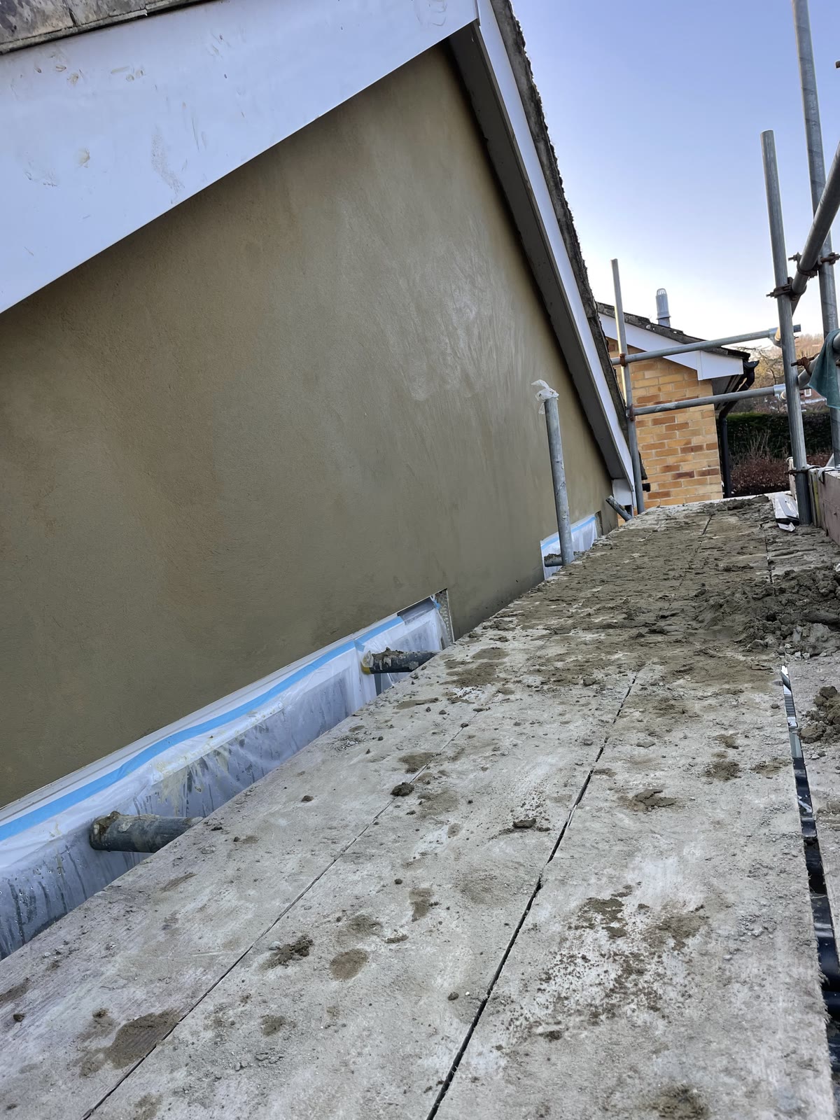 Gable wall with the smooth render coat