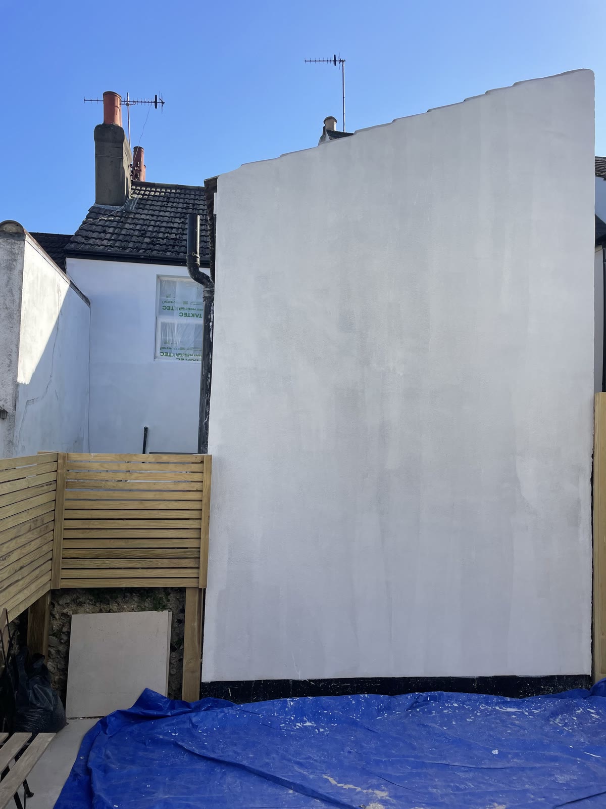Finished rendered gable wall